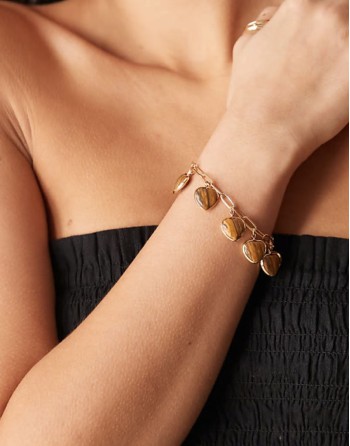 bracelet with faux tigers eye heart charms in gold tone